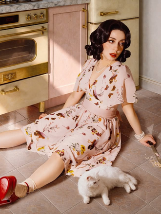 She slips into this Pink Flowers And Birds Bowknot V-Neck Dress and suddenly it's a vintage daydream