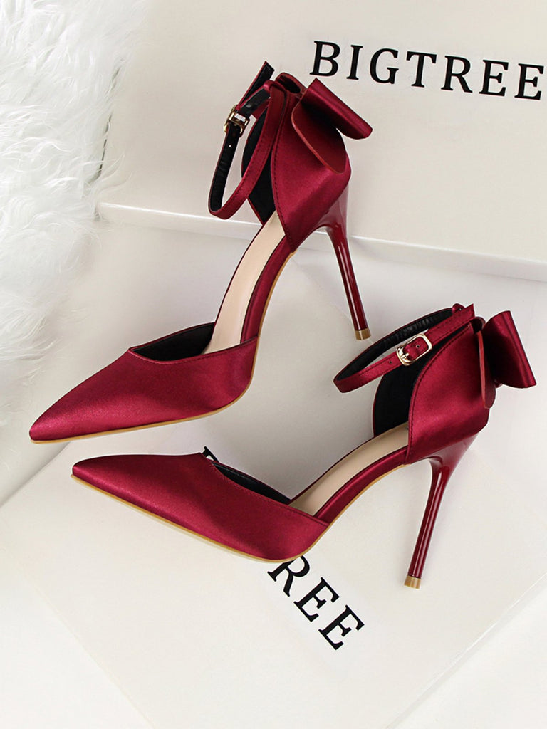 This Pointed Toe Bow Strap Satin High Heels Shoes whispers vintage secrets to those who notice