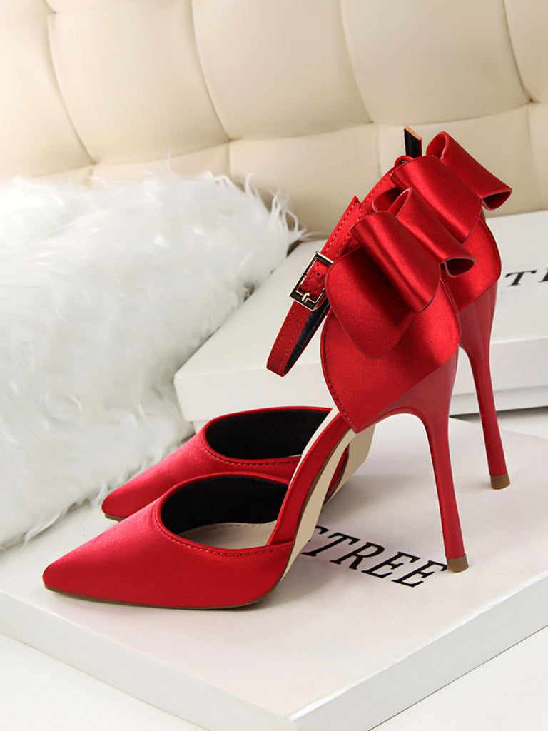 This Pointed Toe Bow Strap Satin High Heels Shoes whispers vintage secrets to those who notice