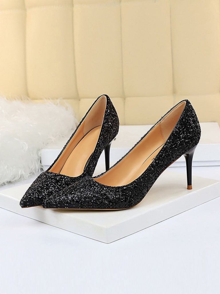 She finds her vintage story in this Pointed Toe Sequins Glitter High Heels Shoes