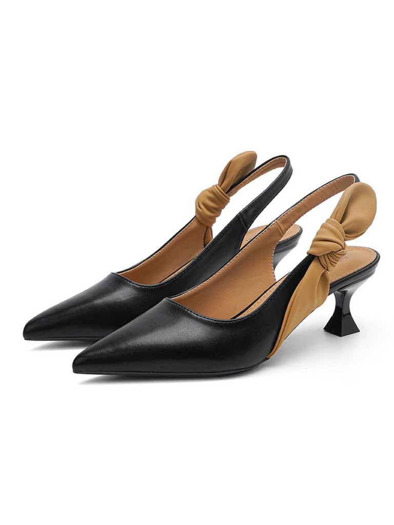 She finds her vintage story in this Pointed-Toe Strappy Stiletto Sandals