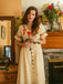 She slips into this Pure Cotton Beige 1940s V-Neck Floral Dress and suddenly it's a 1940s daydream