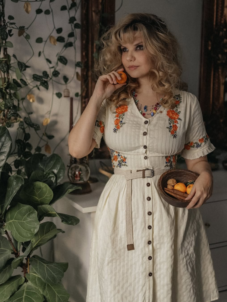 She slips into this Pure Cotton Beige 1940s V-Neck Floral Dress and suddenly it's a 1940s daydream