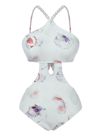 She's wearing Purple 1970s Pearl Shell Print Hollow Straps Swimsuit and the whole beach remembers the 1970s