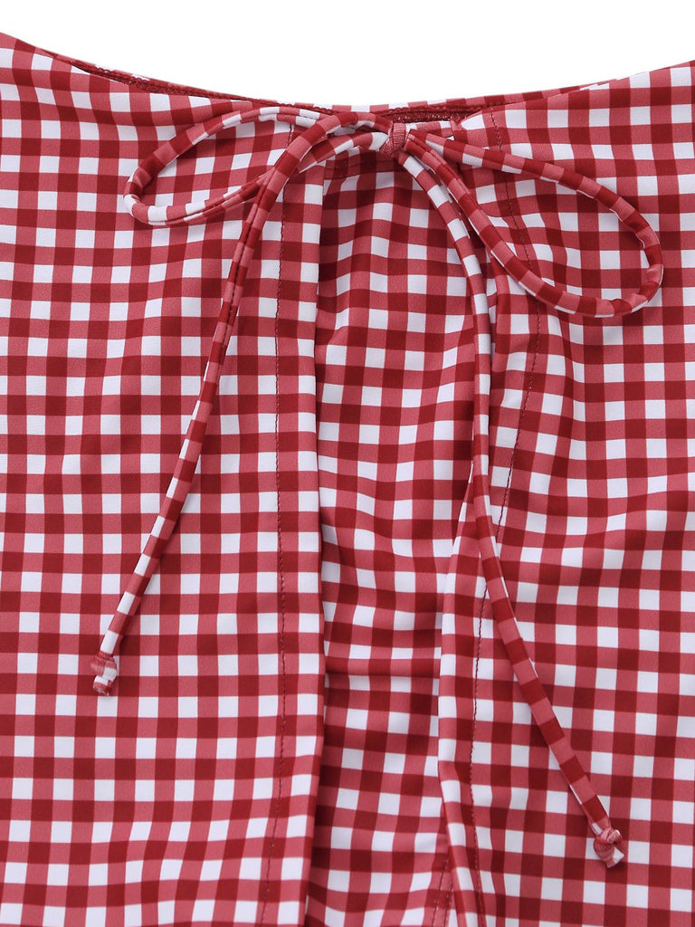 Red and white checkered fabric with a tie detail on a white background
