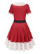 Red 1950s Christmas Candy Cane Dress — the kind of 1950s dress that makes strangers smile