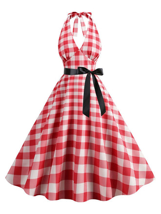 She slips into this Red 1950s Gingham Plaid Halter Swing Dress and suddenly it's a 1950s daydream
