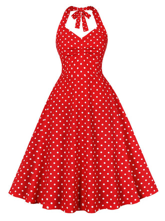 She slips into this Red 1950s Halter Polka Dots Swing Dress and suddenly it's a 1950s daydream
