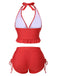 This Red 1950s Halter Solid Ruffle Tankini carries 1950s vacation dreams in every stitch