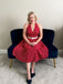 She slips into this Red 1950s Polka Dot Halter Dress and suddenly it's a 1950s daydream