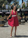 She slips into this Red 1950s Polka Dot Halter Dress and suddenly it's a 1950s daydream