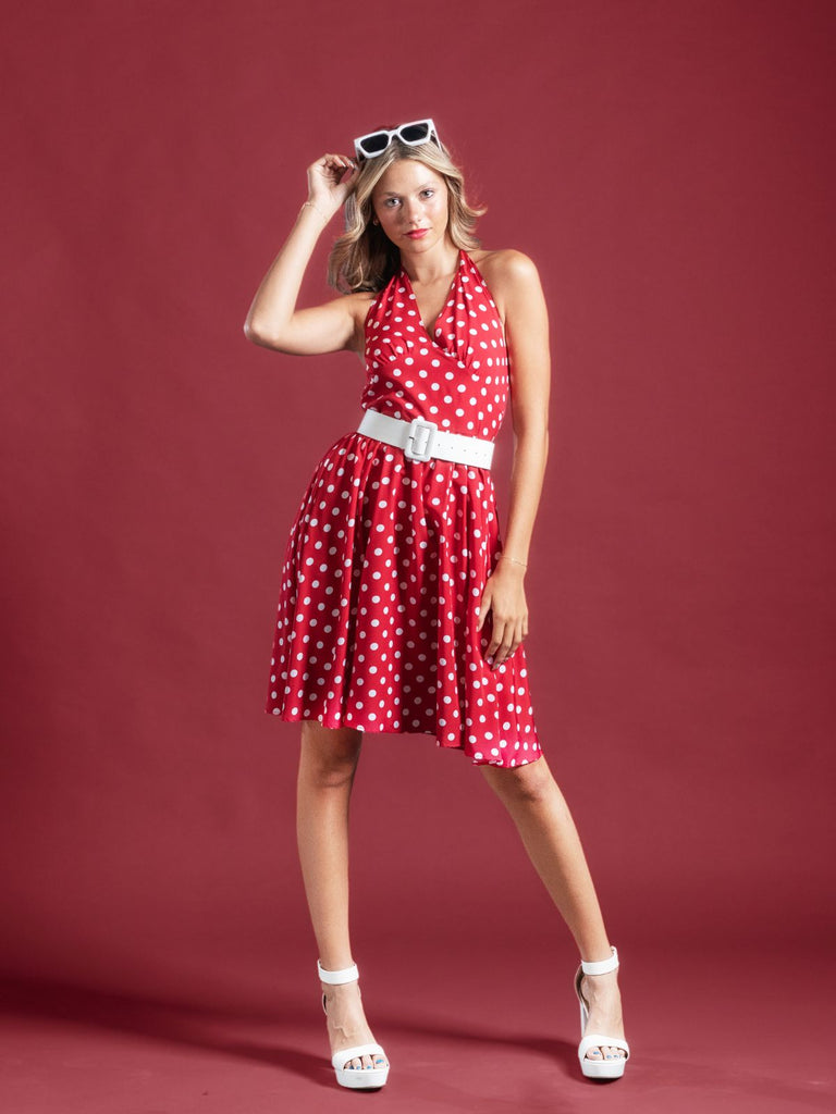 She slips into this Red 1950s Polka Dot Halter Dress and suddenly it's a 1950s daydream