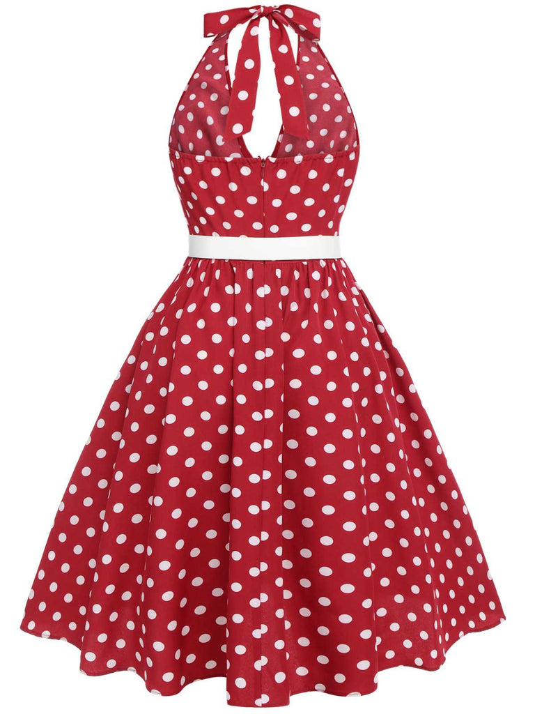 This Red 1950s Polka Dot Halter Dress wraps her in 1950s elegance, one twirl at a time