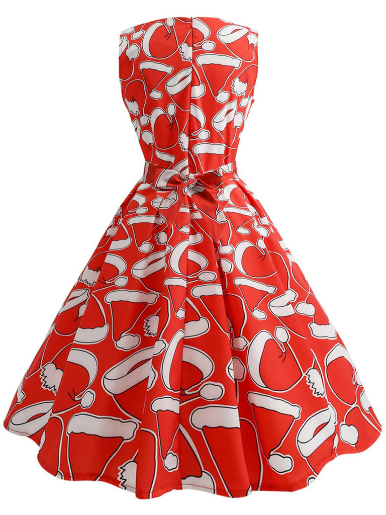 This Red 1950s Santa Hat Sleeveless Swing Dress wraps her in 1950s elegance, one twirl at a time