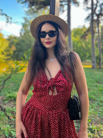 She slips into this Red 1950s Spaghetti Strap Heart Print Dress and suddenly it's a 1950s daydream