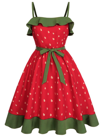 She slips into this Red 1950s Strawberry Ruffle Belt Dress and suddenly it's a 1950s daydream