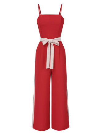 She adds this Red 1970s Spaghetti Strap Belted Stripe Jumpsuit and suddenly it's 1970s perfection
