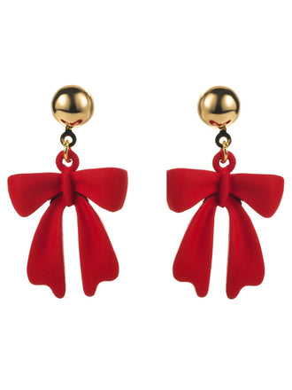 She adds this Red Christmas Bow Drop Earrings and suddenly it's vintage perfection