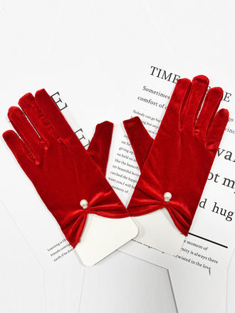 She adds this Red Vintage Velvet Pearl Gloves and suddenly it's 1950s perfection