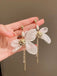 She adds this Retro Alloy 3D Bow Beaded Earrings and suddenly it's 1950s perfection