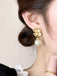 Retro Alloy Flower Pearl Earrings — 1950s elegance in the palm of her hand