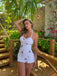 She's wearing Retro Cherry Summer One-piece Swimsuit and the whole beach remembers the 1950s