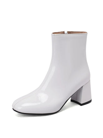 She finds her 1950s story in this Retro Christmas Patent Leather Block Heel Ankle Boots