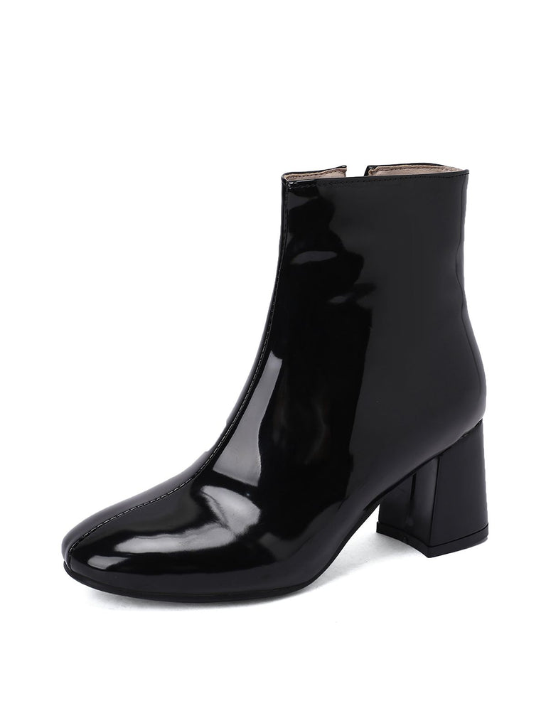 She finds her 1950s story in this Retro Christmas Patent Leather Block Heel Ankle Boots
