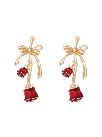 She adds this Retro Gold Ribbon 3D Rose Earrings and suddenly it's 1950s perfection