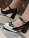 This Retro Leather Colorblock Bowknot Chunky Heels whispers 1950s secrets to those who notice