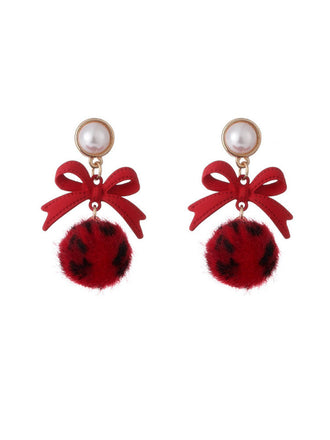 She adds this Retro Bow Leopard Earrings and suddenly it's 1950s perfection