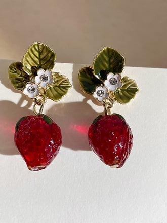 She adds this Retro Rhinestone Strawberry Dangle Earrings and suddenly it's 1950s perfection