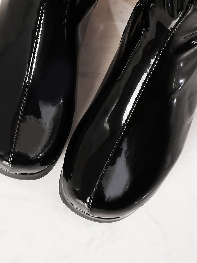 Retro Shiny Patent Leather Thigh-High Boots — 1950s style that transcends decades