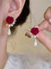 Rose Pearl Pendant Bow Stud Earrings — vintage elegance for the modern woman