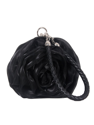 She adds this Silk 3D Flower Vintage Handbag and suddenly it's 1950s perfection