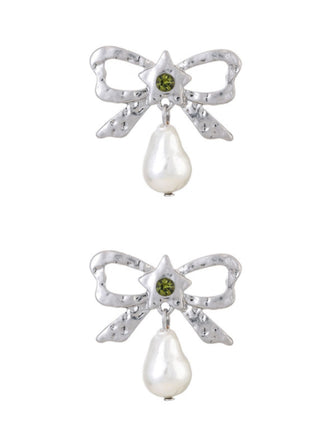 She adds this Silver Bow Star Pearl Drop Earrings and suddenly it's vintage perfection