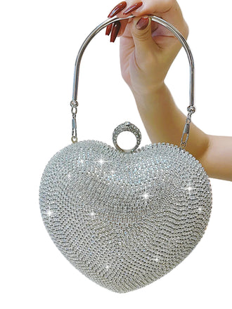 She adds this Silver Heart Rhinestone Party Tote Bag and suddenly it's vintage perfection