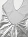 Close-up of a silver metallic Romper with a plunging neckline.