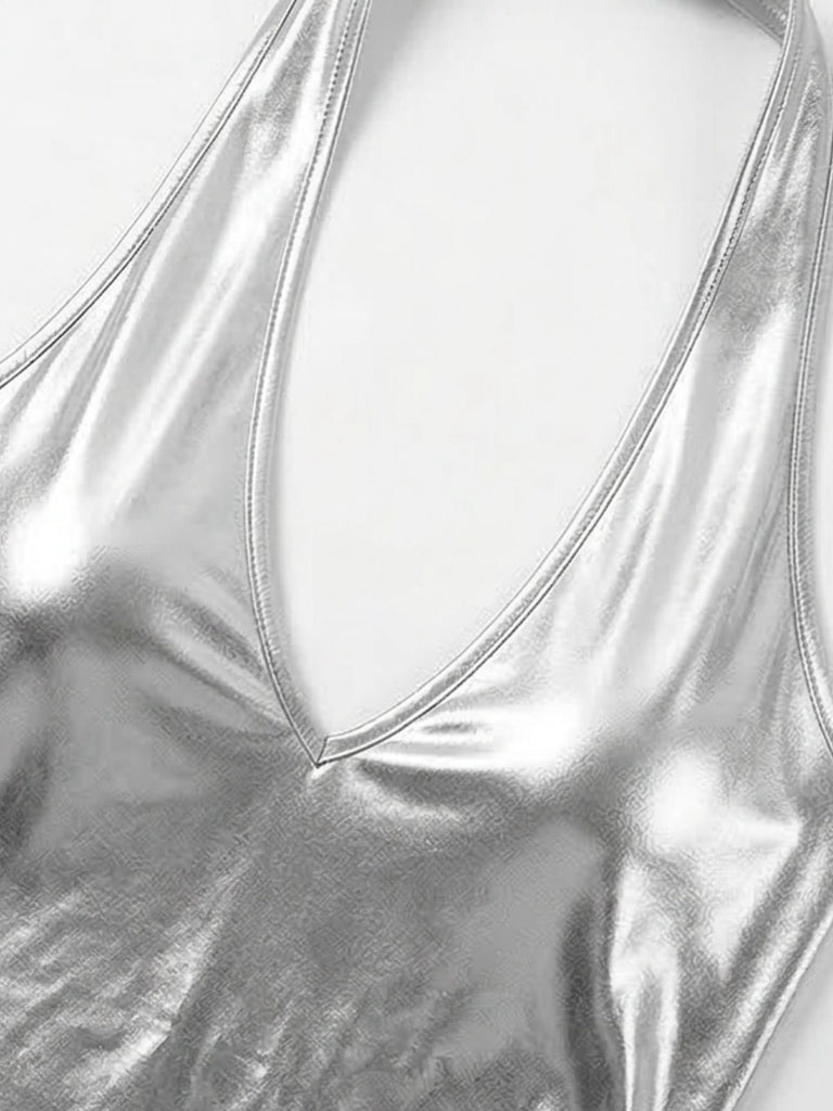 Close-up of a metallic silver Romper with a plunging neckline.