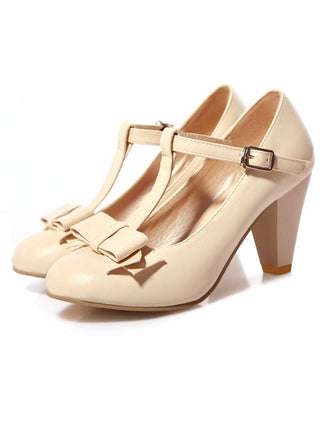 She finds her vintage story in this Solid Leather Bowknot T-Strap Chunky Heels