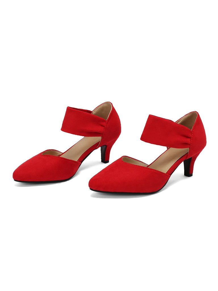 She finds her vintage story in this Solid Pointed Toe Suede Kitten Heels