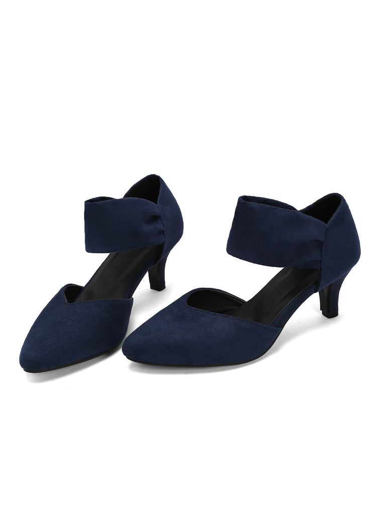 She finds her vintage story in this Solid Pointed Toe Suede Kitten Heels