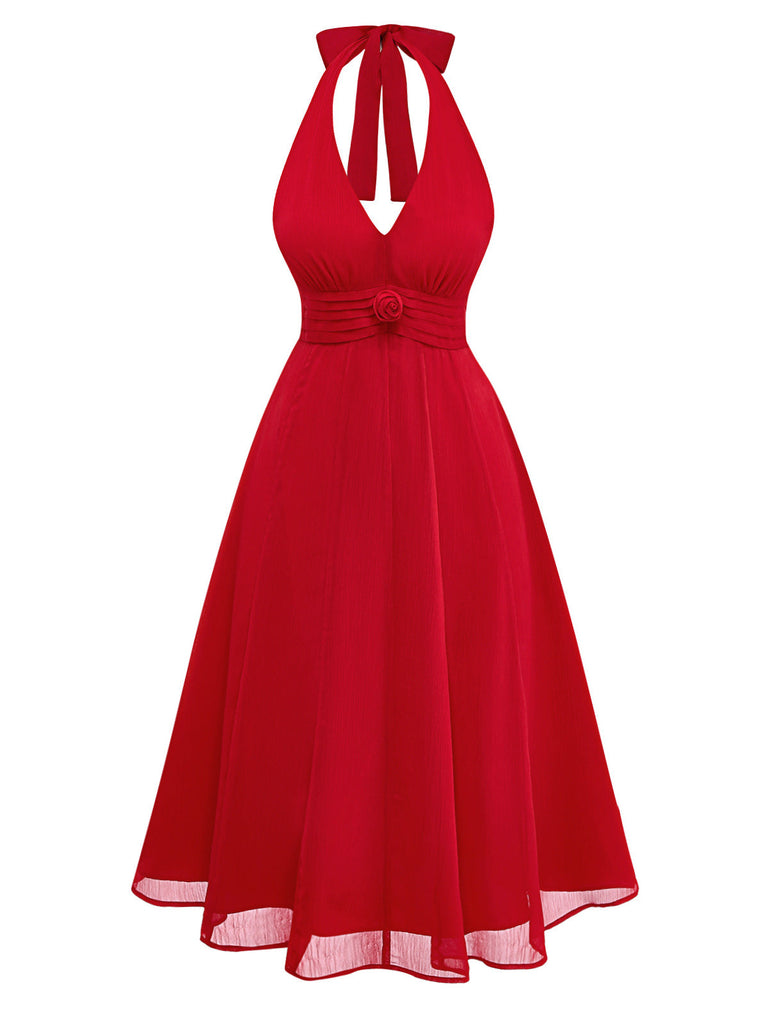 Vibrant red 1940s rose print midi dress with halter neck and lace-up back, perfect for a vintage-inspired garden party or romantic summer date.