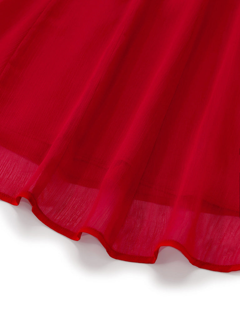 Vibrant red 1940s rose print midi dress with halter neck and lace-up back, perfect for a vintage-inspired garden party or romantic summer date.