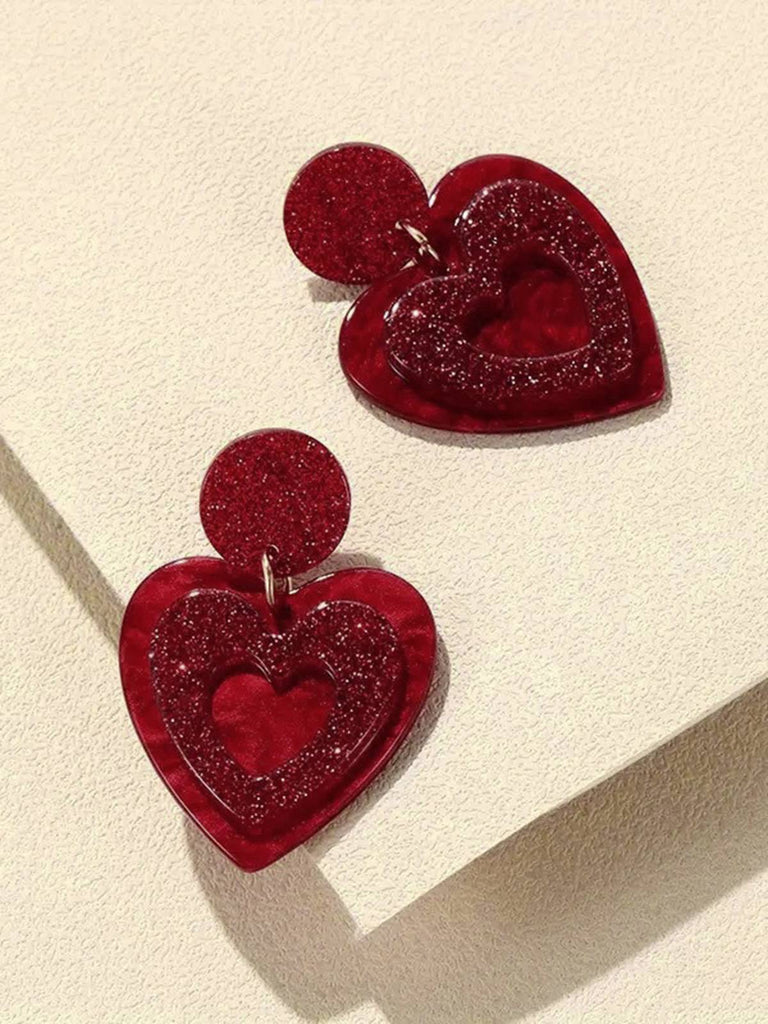 She adds this Valentine Glitter Heart Shape Dangle Earrings and suddenly it's vintage perfection