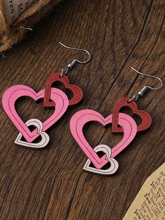 She adds this Valentine Triple Layer Heart Drop Earrings and suddenly it's vintage perfection