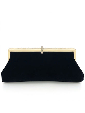 She adds this Vintage Black Velour Rhinestones Handbag and suddenly it's 1950s perfection