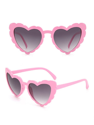 She finds her 1950s story in this Vintage Curved Heart Frame Sunglasses