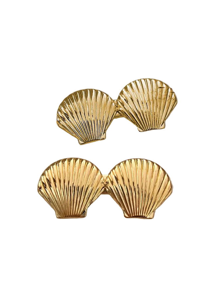 She finds her 1950s story in this Vintage Double Shell Metal Hairpin