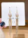Vintage Gold Pearl Tassel Earrings - vintage fashion, retro style, glamorous gold